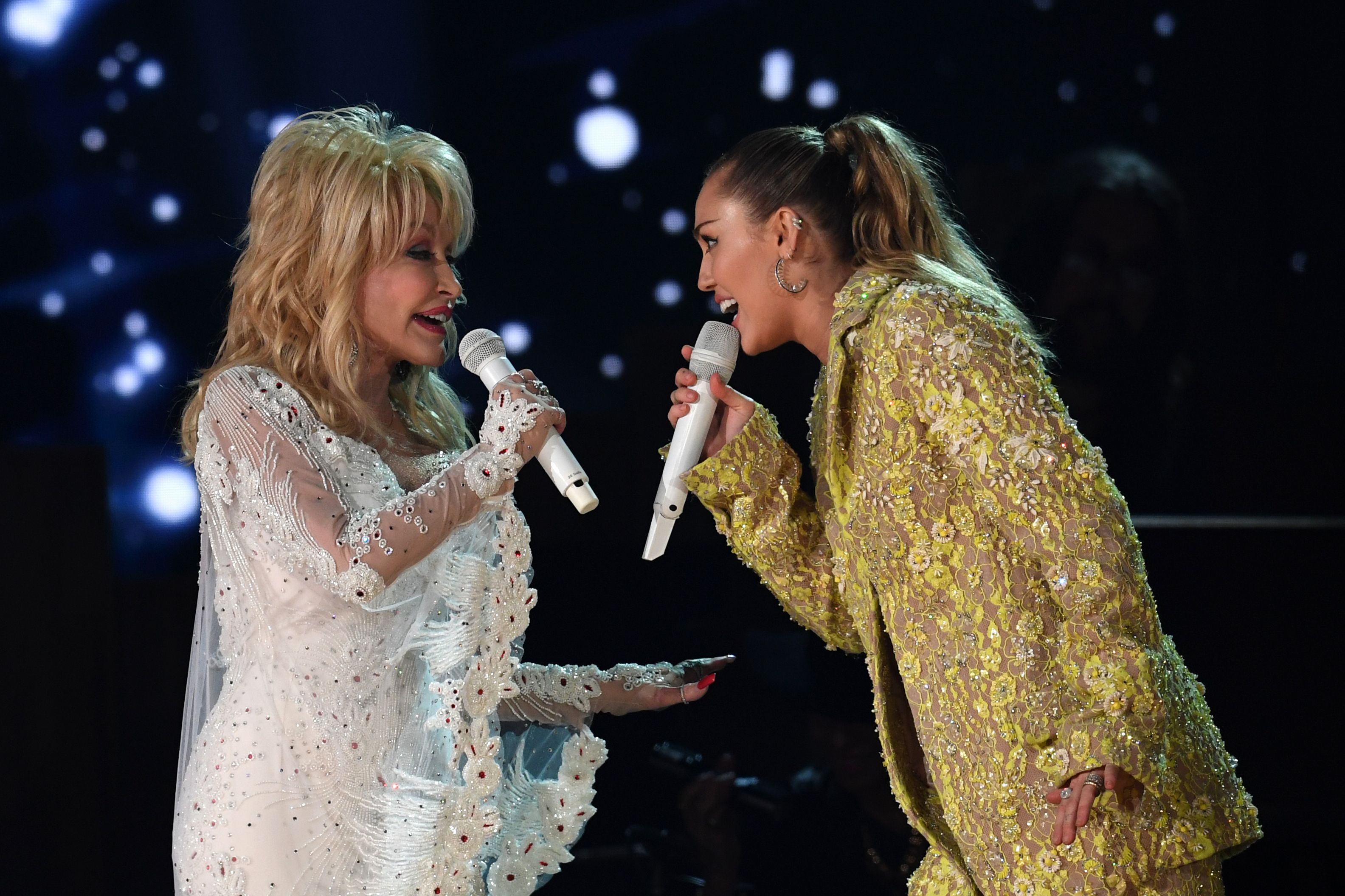 Miley Cyrus performing with Dolly Parton 