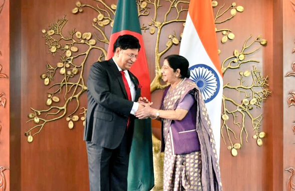 Indian External Affairs Minister Sushma Swaraj (Right) and Bangladesh Foreign Minister Dr AK Abdul Momen (Left) share greetings before co-chairing the 5th Joint Consultative Commission (JCC) meeting in New Delhi. 
