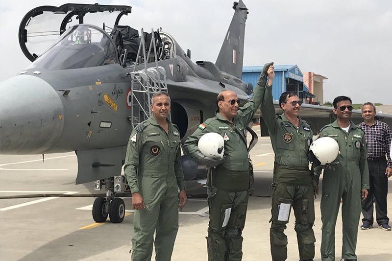 Defence Minister Rajnath Singh flew in a Tejas fighter aircraft on Thursday