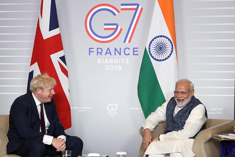 PM Modi talks to Boris Johnson at the G7 summit